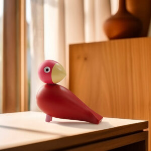 Oiseau Flora Songbird de Kay Bojesen édition spéciale millésime 2024 en bois laqué rouge